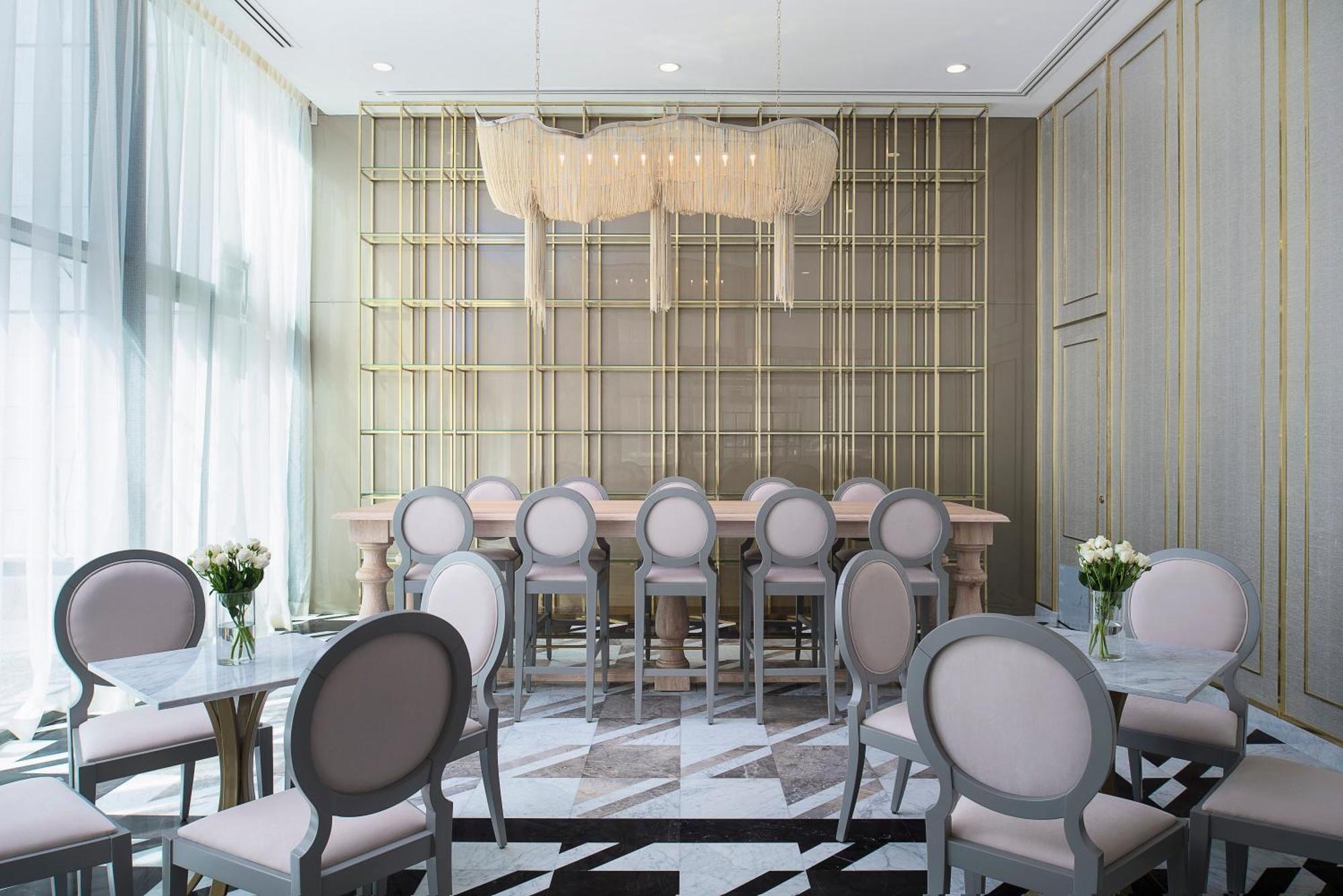 Dusit Doha Hotel Экстерьер фото The interior of the restaurant