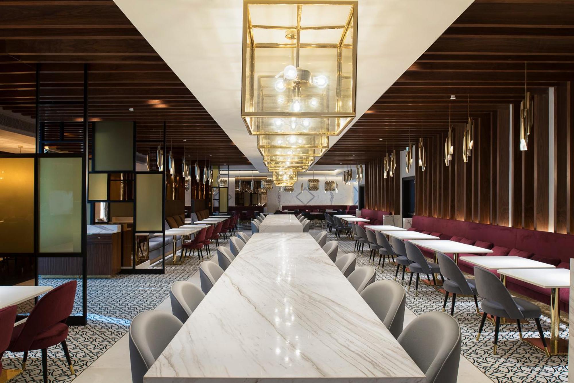 Dusit Doha Hotel Экстерьер фото The interior of the lounge